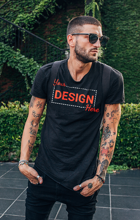 Man wearing a custom printed t-shirt featuring a ‘Your Design Here’ graphic for personalized apparel
